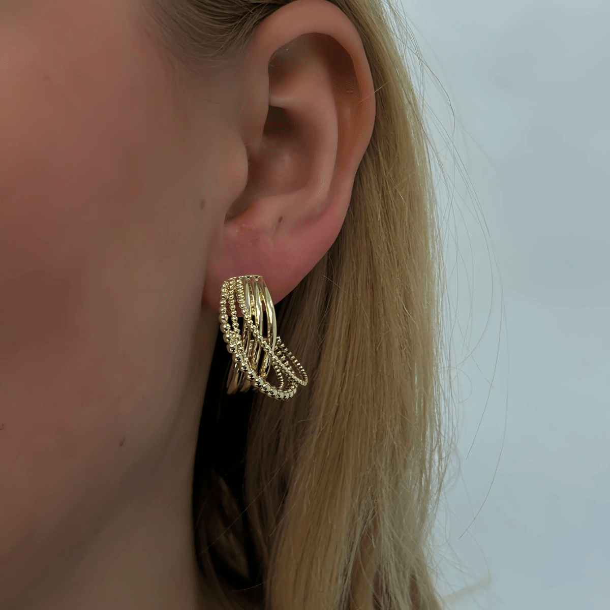 The icon twist earrings gold